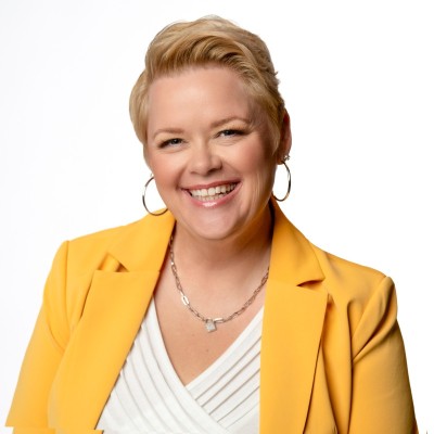 Woman in yellow blazer