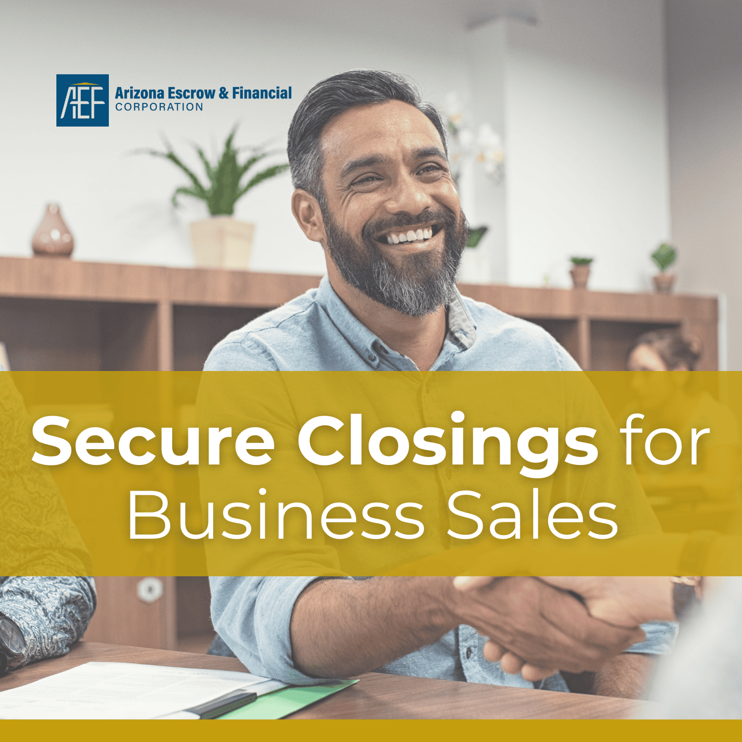 A man smiling and shaking hands. Secure closings for business sales.