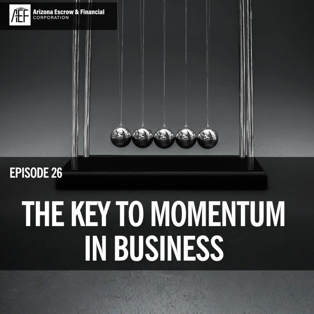 a black and gray image of a static newton's cradle